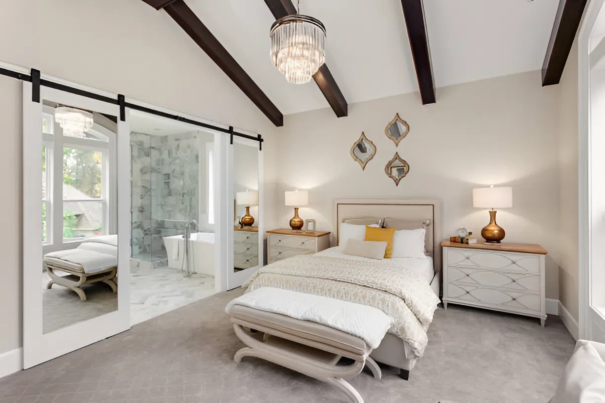 Relaxing bedroom interior painted in crisp white by a house painter in New London, NH