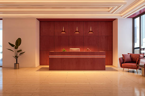 Reception area with warm neutral walls and custom wood finishes by a painting company in Hanover, NH