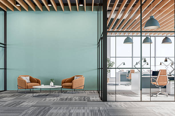Office interior with soft blue-green accent walls and wood accents by a painting company in Hanover, NH