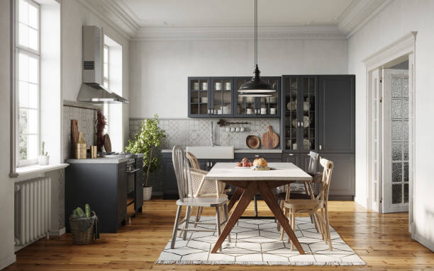 Kitchen with dark painted cabinetry, white walls and trim by a house painter in Hanover, MI