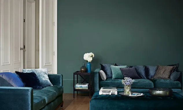 Teal living room walls with an eggshell finish by an interior painter in Norwich, VT